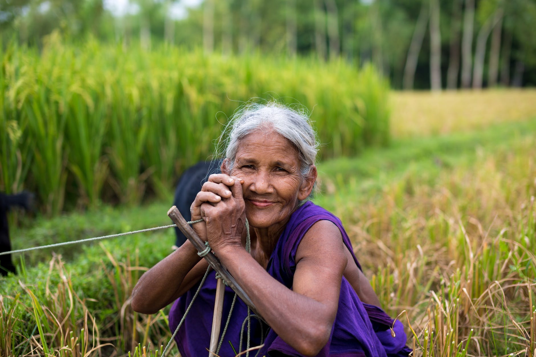 smiling woman at the field